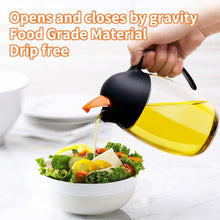 Load image into Gallery viewer, MJDFS Olive Oil Dispenser Bottle W/Auto Flip Cap, 21oz Cooking Oil Dispenser Leakproof, Kitchen True No Drip Oil and Vinegar Cruet Container with Non-Slip Handle, Cute Penguin Design